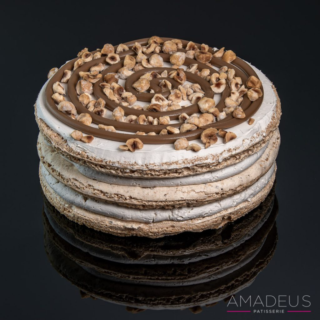 Chocolate and vanilla cake with toppings.